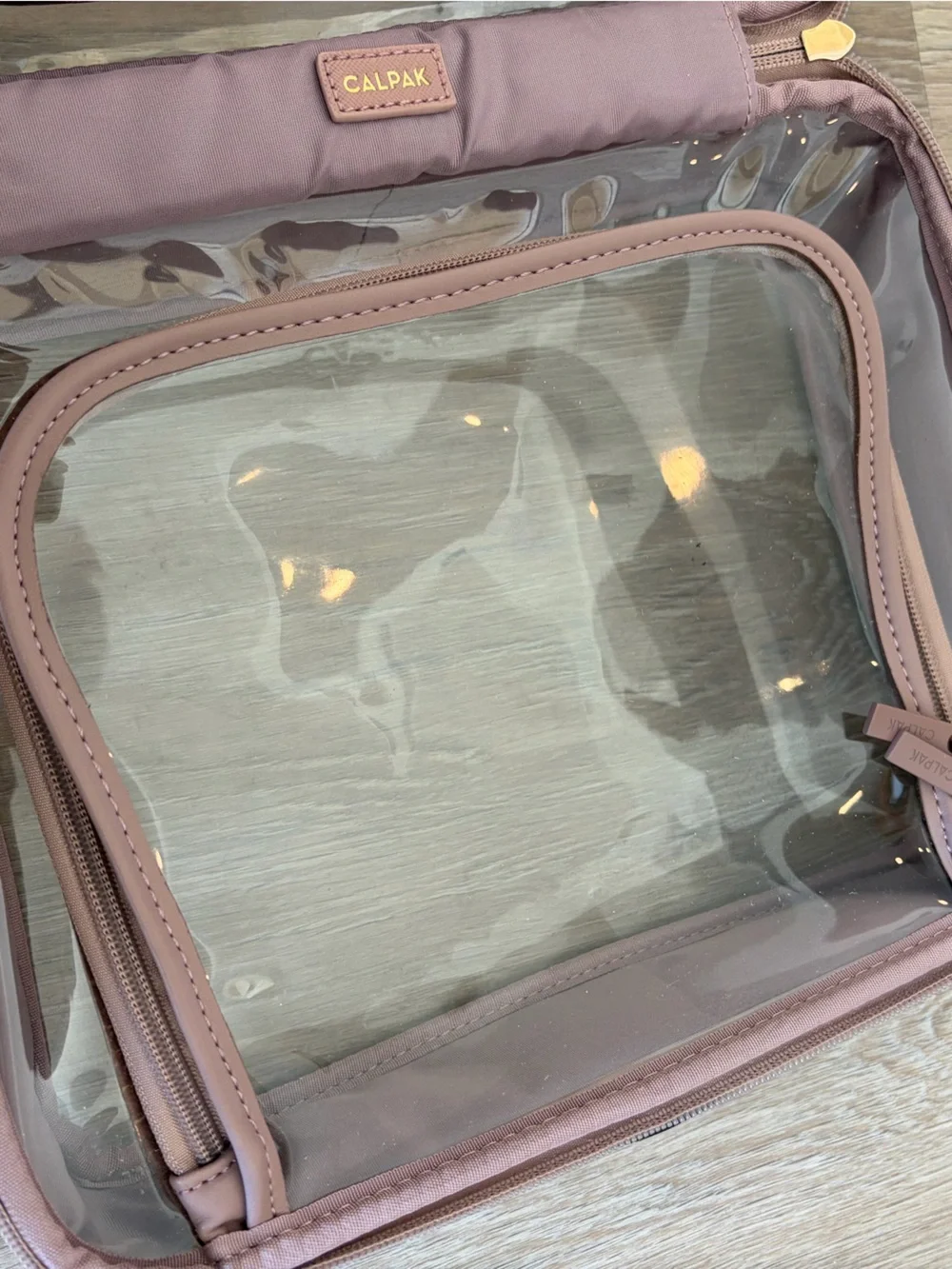 CALPAK Large Clear Cosmetics Case in Mauve/Pink